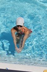 JESSICA ALBA in Bikini at a Pool in Miami 08/08/2025