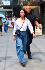 KATY PERRY Out in a White Shirt and Jeans in New York City 08/12/2025