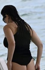 KOURTNEY KARDASHIAN in Swimsuit at a Beach in Miami 08/27/2025
