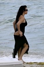 KOURTNEY KARDASHIAN in Swimsuit at a Beach in Miami 08/27/2025