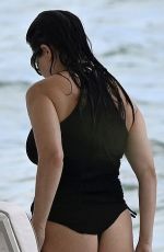 KOURTNEY KARDASHIAN in Swimsuit at a Beach in Miami 08/27/2025