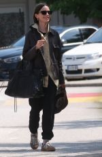 LILY COLLINS Arrives in Venice Ahead of Filming for Emily in Paris 08/14/2025