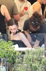 LILY COLLINS on the Set of Emily In Paris in Venice 08/15/2025