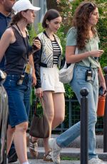 LILY COLLINS on the Set of Season 5 of Emily in Paris in Paris 08/04/2025