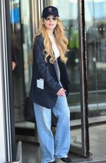 LINDSAY LOHAN Arrives at JFK Airport in New York City 08/15/2025