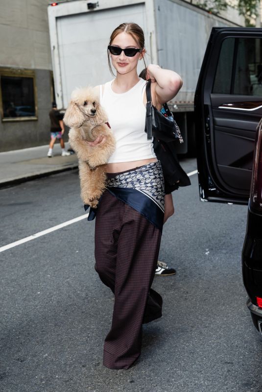 LOLA TUNG Out with Her Dog in New York City 07/15/2025