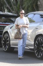 LORI HARVEY Arrives at a Friend