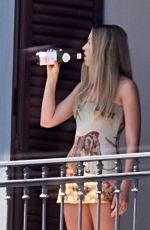 MARGOT ROBBIE at Balcony of Grand Hotel Parker