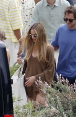 MARGOT ROBBIE Leaves a Restaurant with Friends in Ibiza 07/08/2025