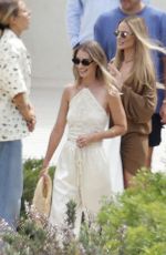 MARGOT ROBBIE Leaves a Restaurant with Friends in Ibiza 07/08/2025