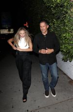 MARGOT ROBBIE Leaves Cara Delevingne