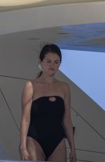SELENA GOMEZ in a Black Swimsuit on a Luxury Yacht in Cabo San Lucas 08/24/2025