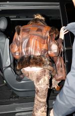 BELLA HADID Leaves Her Hotel in a Leathery Ensemble in Paris 09/29/2025