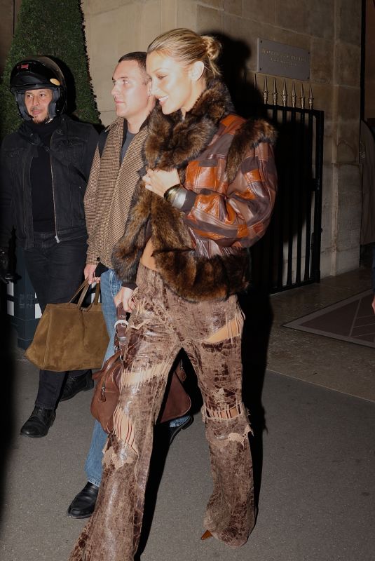 BELLA HADID Leaves Her Hotel in a Leathery Ensemble in Paris 09/29/2025