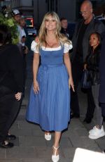 HEIDI KLUM Leaves Her Hotel in Munich 09/16/2025
