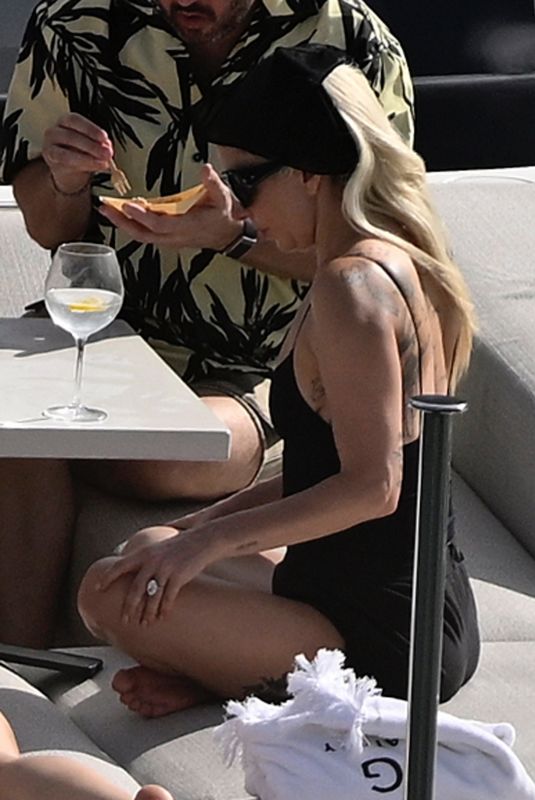 LADY GAGA in a Black One-piece Bathing Suit at a Yacht in Miami 09/02/2025