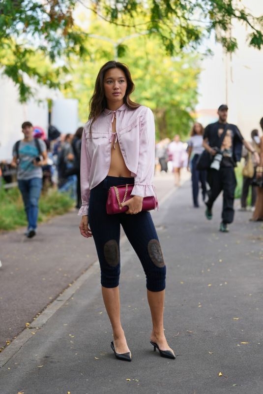 LILY CHEE Arrives at Prada S/S ’26 Fashion Show at Milan Fashion Week 09/25/2025
