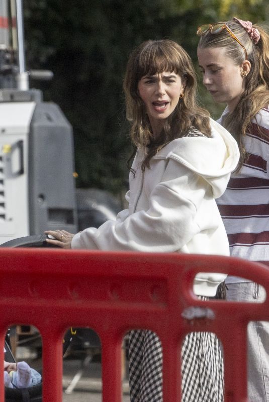 LILY COLLINS on the Set of Close Personal Friends in London 09/18/2025