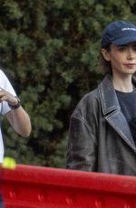LILY COLLINS on the Set of Close Personal Friends in London 09/21/2025