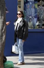 LILY COLLINS Shopping for Baby Clothes Out in Notting Hill in London 09/24/2025