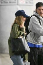 MARGOT ROBBIE and Her Brother Cameron Land at JFK Airport in New York City 09/12/2025