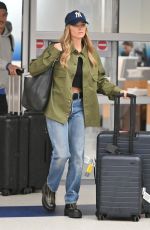 MARGOT ROBBIE and Her Brother Cameron Land at JFK Airport in New York City 09/12/2025