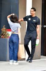 RACHEL ZEGLER and Nathan Louis Fernand Picks up a Jacket at a Charity Shop in London 08/31/2025