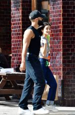 RACHEL ZEGLER and Nathan Louis Fernand Picks up a Jacket at a Charity Shop in London 08/31/2025