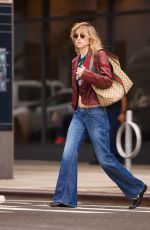 SUKI WATERHOUSE in Red Leather and Denim Out in New York 09/15/2025