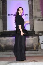 ANNE HATHAWAY Arrives at God