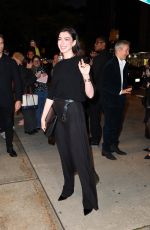 ANNE HATHAWAY Arrives at God