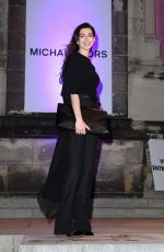ANNE HATHAWAY Arrives at God