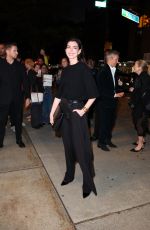ANNE HATHAWAY Arrives at God