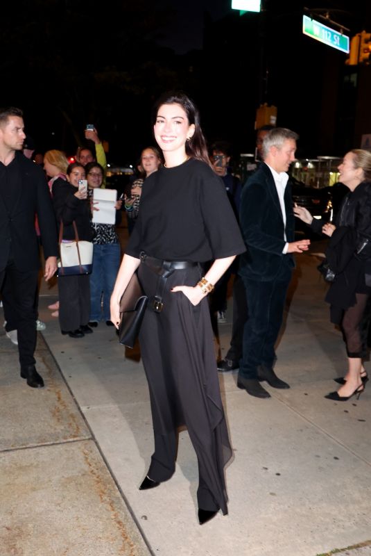 ANNE HATHAWAY Arrives at God