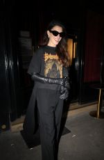 ANNE HATHAWAY Leaves Balenciaga Fashion Show at PFW in Paris 10/04/2025