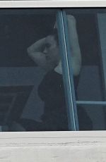 BILLIE EILISH on Her Hotel Balcony in Miami 10/12/2025