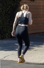 DAKOTA FANNING Out for a Walk in Los Angeles 10/29/2025