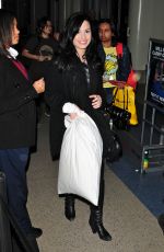 DEMI LOVATO Arrives at LAX Airport 12/18/2009