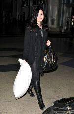 DEMI LOVATO Arrives at LAX Airport 12/18/2009