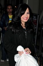 DEMI LOVATO Arrives at LAX Airport 12/18/2009
