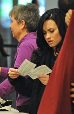 DEMI LOVATO Arrives at LAX Airport 12/18/2009