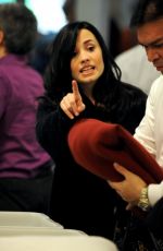 DEMI LOVATO Arrives at LAX Airport 12/18/2009