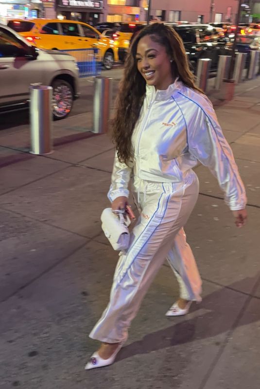 JORDYN WOODS in a White Tracksuit Arrives at Knicks Game in New York City 10/24/2025