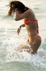 RIHANNA in Bikini on the Beach in Barbados 12/29/2011