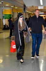 ANYA TAYLOR-JOY and Malcolm McRae at JFK International Airport in New York City 11/13/2025