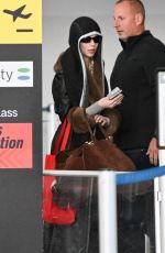 ANYA TAYLOR-JOY and Malcolm McRae at JFK International Airport in New York City 11/13/2025