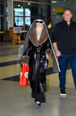 ANYA TAYLOR-JOY and Malcolm McRae at JFK International Airport in New York City 11/13/2025