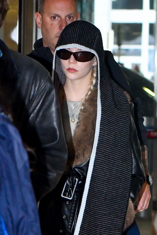 ANYA TAYLOR-JOY and Malcolm McRae at JFK International Airport in New York City 11/13/2025