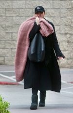 CHRISSY TEIGEN Arrives at a Dental Appointment in Westwood 11/17/202