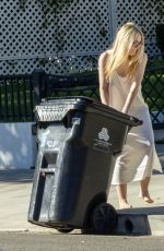 DAKOTA FANNING Takes in Her Trash Bin in Los Angeles 10/31/2025